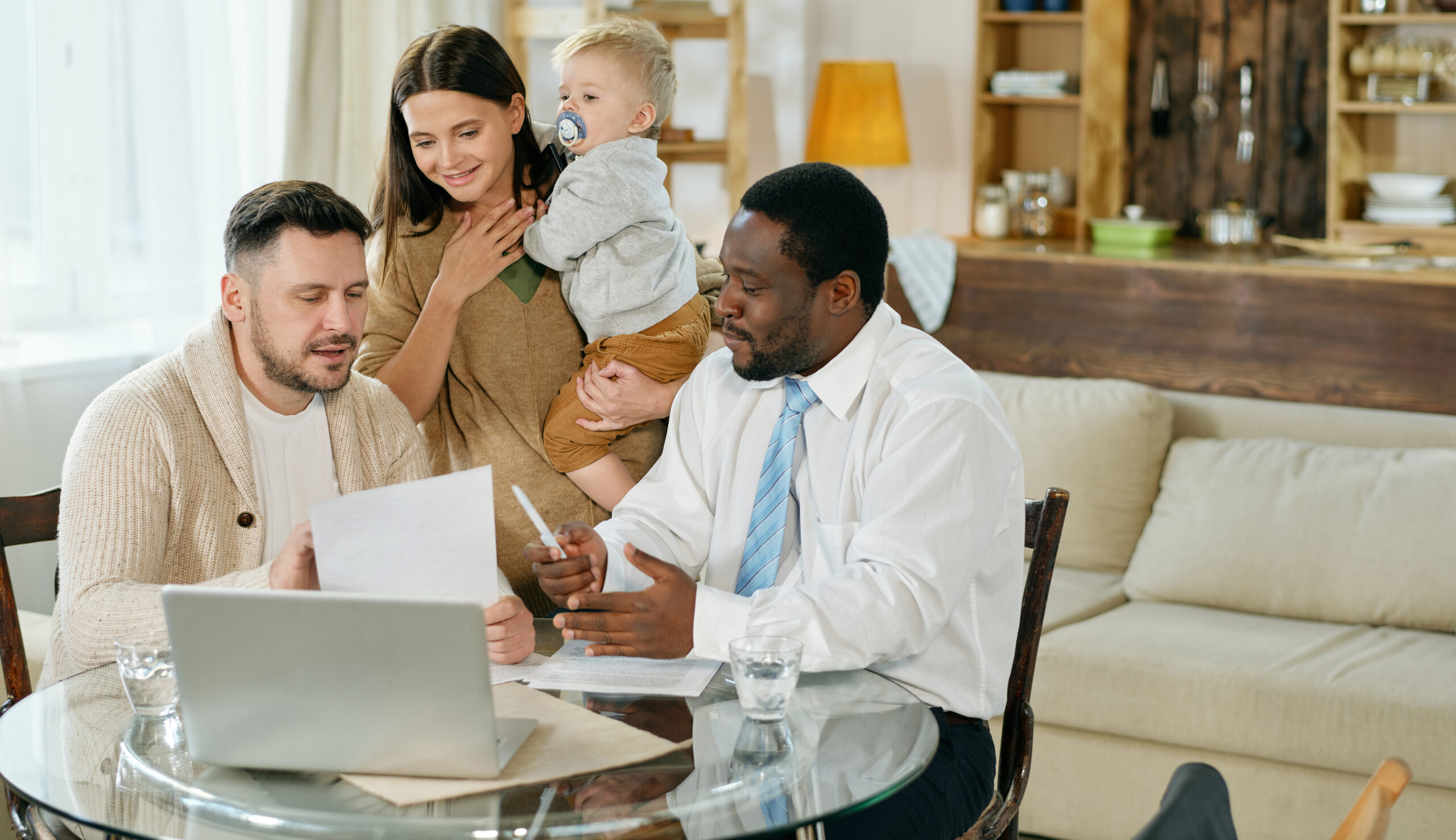 Content Family with Little Boy Having Visit of African American Adviser